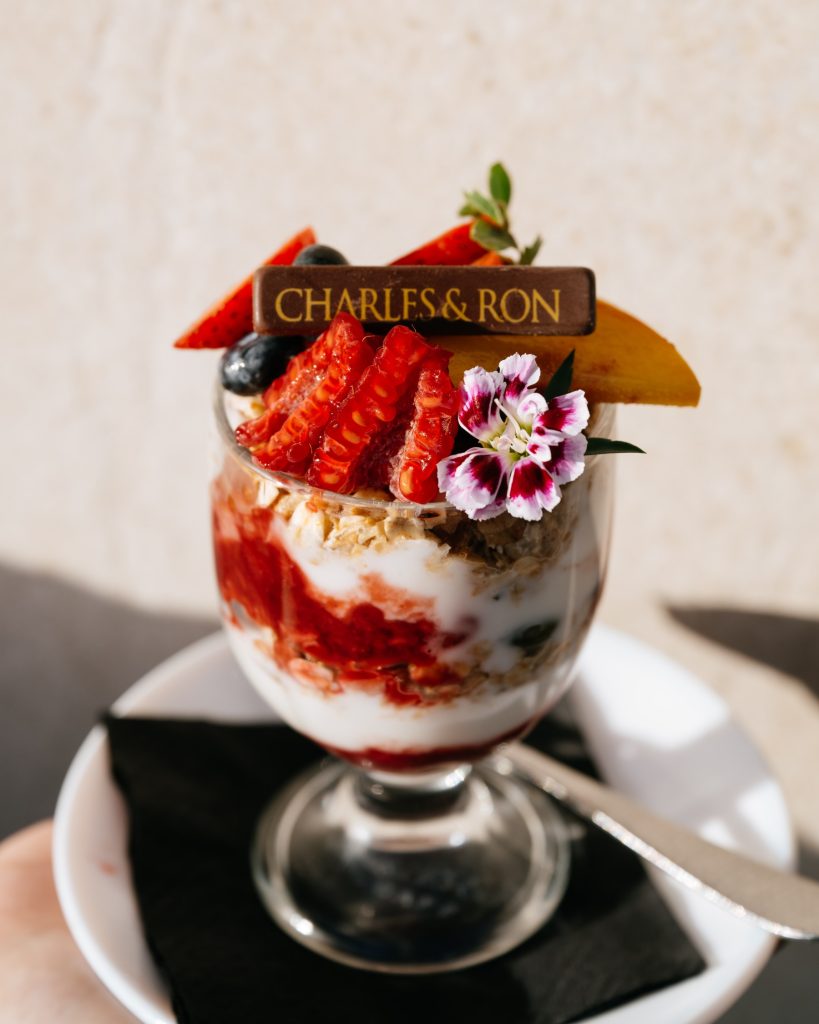 Parfait with berries, edible flowers, chocolate Charles & Ron.